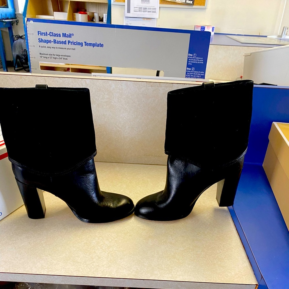 Michael Kors black leather boots with silver hardware